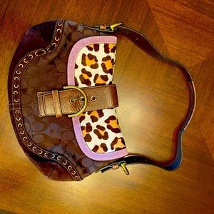 Coach purse with Ocelot fur